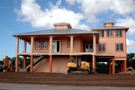 southwest rusted metal house on stilts|stilt house foundation.